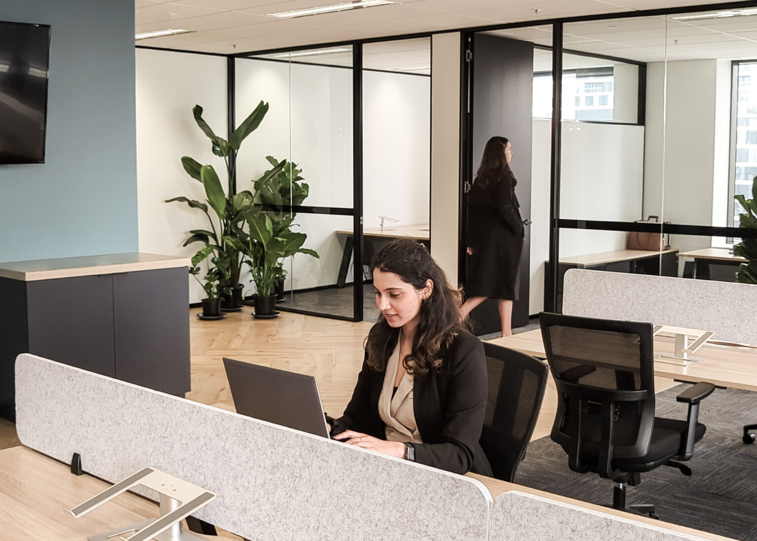 A female employee taking a Office meeting